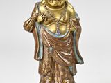 an image of a statue of a smiling buddha on a white background