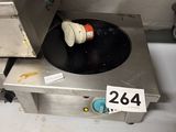 a stove top with a frying pan sitting on top of it