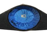 a close up of a black hat with a blue lining