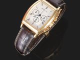 une montre-bracelet en or 18 carats avec un bracelet en cuir marron
