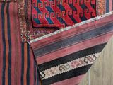 a close up of a rug on a wooden floor