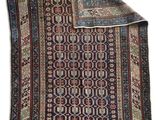 a rug with a pattern on it and a white background