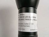 a close up of a flashlight with a label on it
