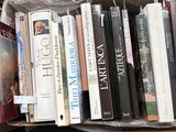 a box full of books sitting on a table