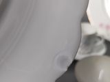 a close up of a plate and a bowl on a table