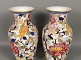 pair of chinese vases decorated with flowers and birds