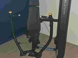 an image of a home gym equipment in the corner of a room