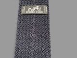 a close up of a tie with a label on it