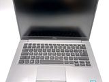 a laptop computer that is sitting on a table