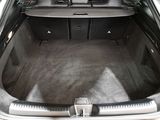 a trunk of a car with the back seats folded down