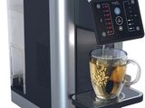 une image représentant une machine à café dans laquelle se trouve une tasse de thé