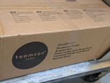 a box on the back of a truck that is loaded with items