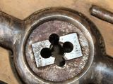 a close up view of a metal lock with a key in it