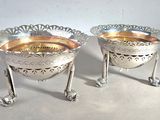 pair of antique silverplated footed bowls on cast legs