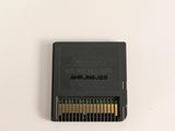 a close up of a memory card on a white surface