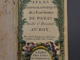 an open book with a picture of a bird on the cover