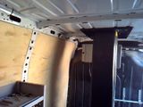 a picture of a van that has been built into a wall