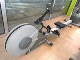 a stationary exercise bike in the corner of the room