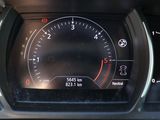 a close up of a car dashboard with a speedometer