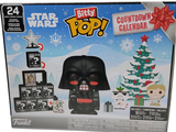 une boîte contenant une figurine de Darth Vader et un sapin de Noël
