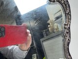 a man taking a selfie in front of a mirror