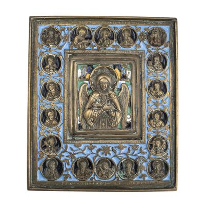 une plaque dorée et bleue représentant un ange tenant un enfant dans ses bras