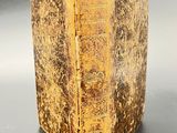 an old book that is sitting on a table