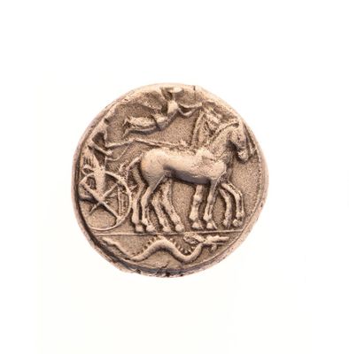 une image d'une pièce de monnaie sur laquelle figure un cheval