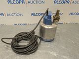 a close up of a hose and a water pump on a table