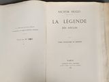 an open book on a table with the title la legendde written in french
