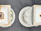 two plates that are sitting next to each other on a table