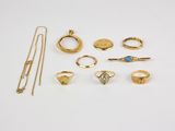a collection of gold jewellery including rings, rings and necklaces