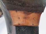 a close up of a pair of shoes that are on a table