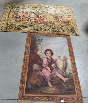 painting on the floor of a room with a painting of a boy and a sheep