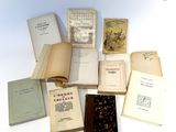 a lot of books that are sitting on a table