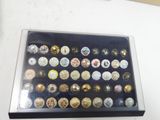 a display case with a lot of coins in it