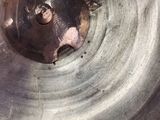 a close up of a metal pan with a hole in it