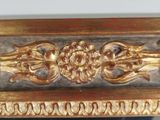 a picture of a gold and silver picture frame