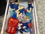 a drawer full of baby items that are in the drawer
