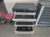 a few drawers that are sitting on the floor