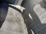 a black seat in the back of a car