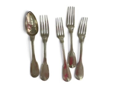 four forks and two spoons on a white surface