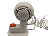 an image of a small white fan with a cord attached to it