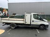 a white truck that is parked in a parking lot