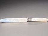 a knife that is sitting on a table