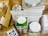 a lot of boxes and plates on the floor