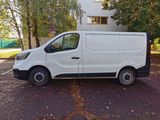 a white van that is parked in a parking lot