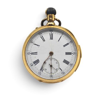 a gold pocket watch with roman numerals on the face