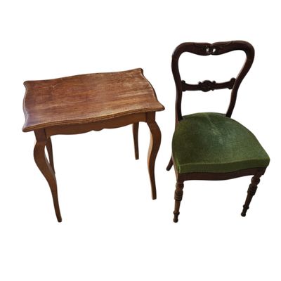 two chairs and a table are sitting next to each other on a white background