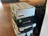 a stack of boxes sitting on top of each other on the floor